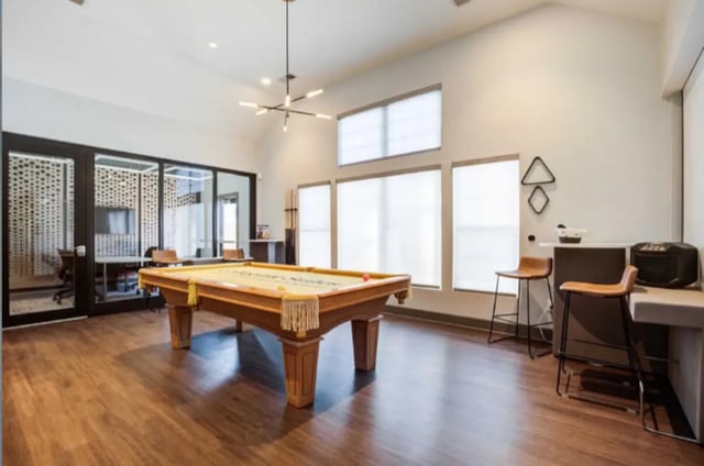 Billiard table study area and bar stools recreation area at Collegiate Suites of Blacksburg in Blacksburg Student Accommodation