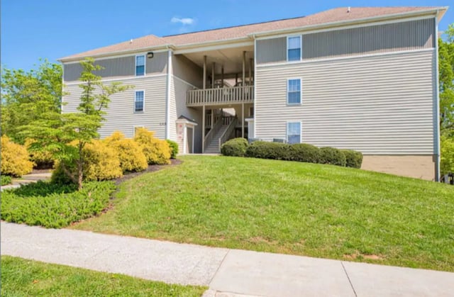 Apartment building with balcony and stairs exterior at Collegiate Suites of Blacksburg in Blacksburg Student Accommodation