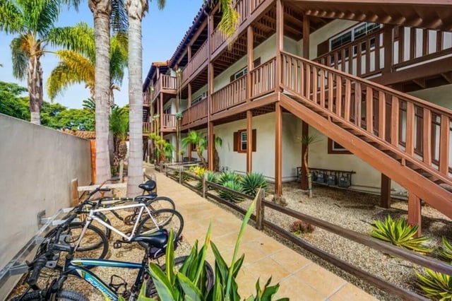 Bicycles parked by stairs exterior at Solis Isla Vista in Isla Vista Student Accommodation