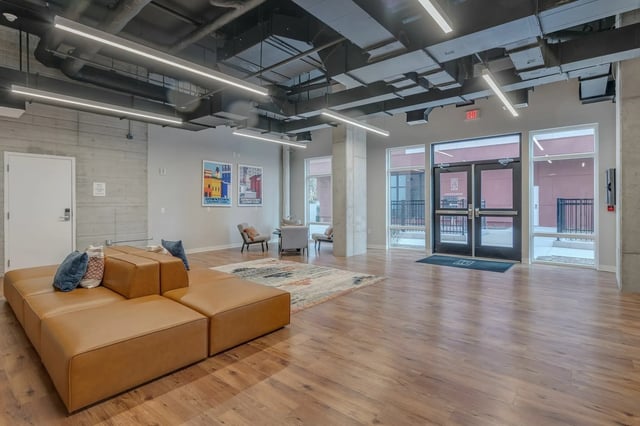 Leather sectional sofa and chairs lounge area at The Ross Salisbury in Salisbury Student Accommodation