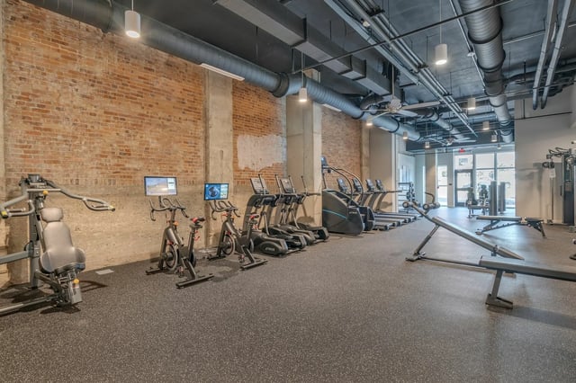 Gym equipment including bikes treadmills and benches fitness area at The Ross Salisbury in Salisbury Student Accommodation