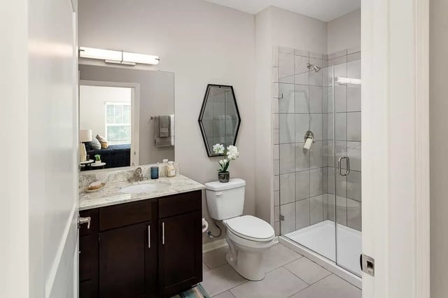 Modern vanity toilet and tiled shower bathroom at Avoca in Louisville Student Accommodation