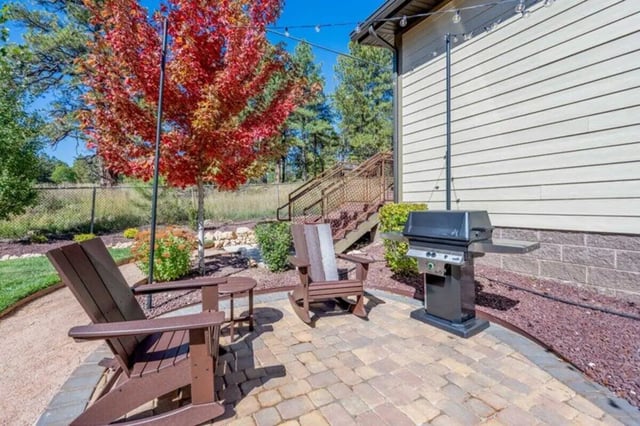 Adirondack chairs and grill outdoor patio exterior at The Commons at Sawmill in Flagstaff Student Accommodation
