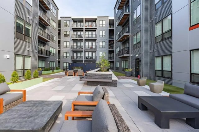 Modern apartment courtyard with seating exterior at 8th and High Columbus in Columbus Student Accommodation