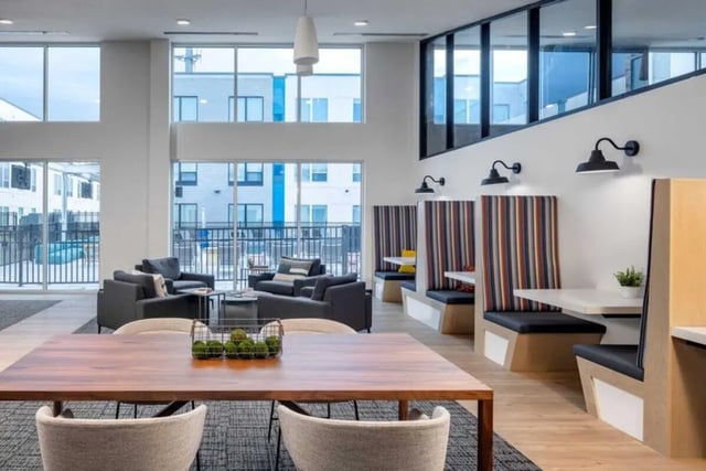Cozy booths and dining table communal area at Proxi Lawrence in Lawrence Student Accommodation