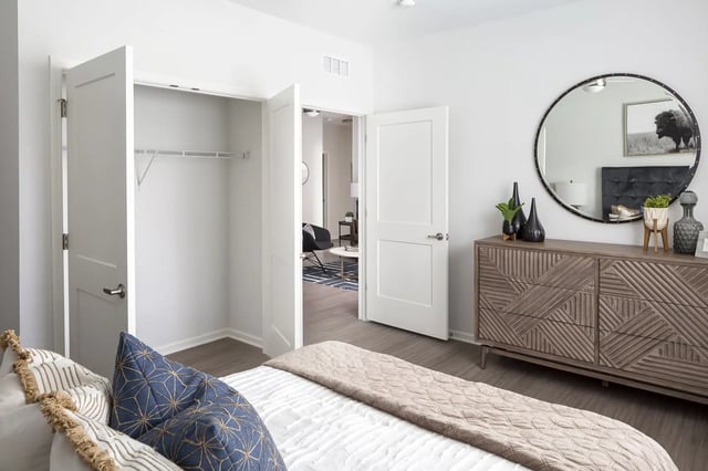 Closet dresser mirror bed pillows bedroom at Frontgate in Louisville Student Accommodation