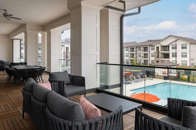 Patio furniture and pool area exterior at The Belltower in Louisville Student Accommodation