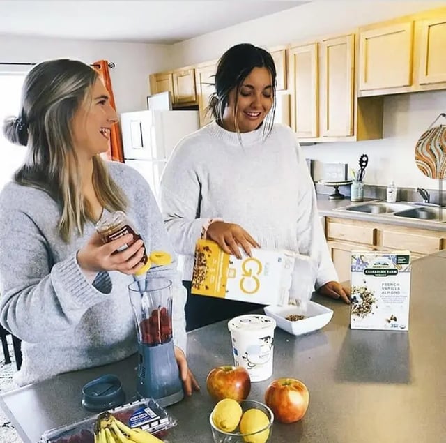 Students making breakfast in modern kitchen kitchen at Copper Beech at Ames in Ames Student Accommodation