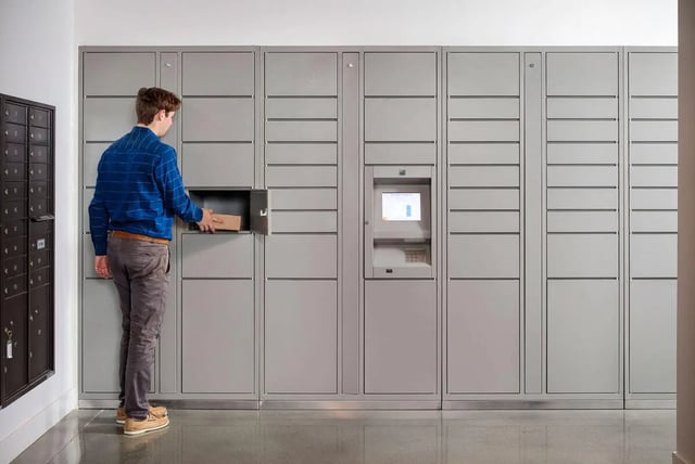 Man places package in modern secure package lockers at M @ College in San Diego Student Accommodation