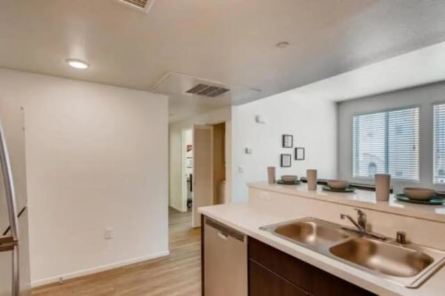 Kitchen counter double sink and open doorway kitchen at Prisma in San Diego Student Accommodation