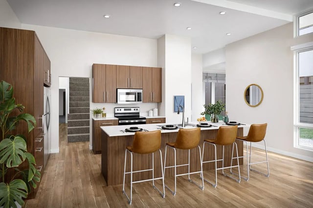Island with chairs appliances cabinets kitchen at The Cove in Goleta Student Accommodation