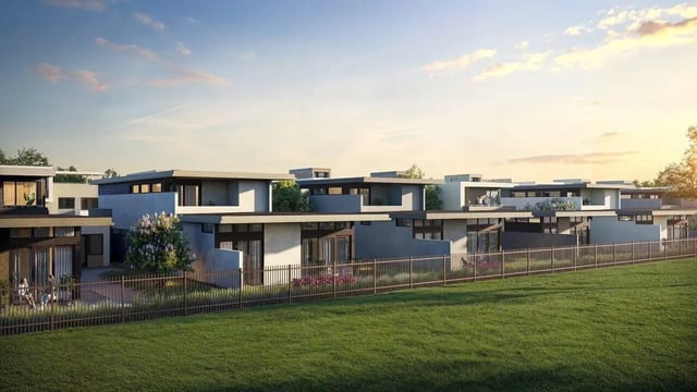 Modern townhouses with balconies and green lawns exterior at The Cove in Goleta Student Accommodation