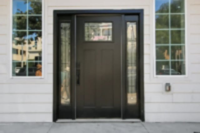 Dark front door with windows exterior at Heritage 2831 in Los Angeles Student Accommodation