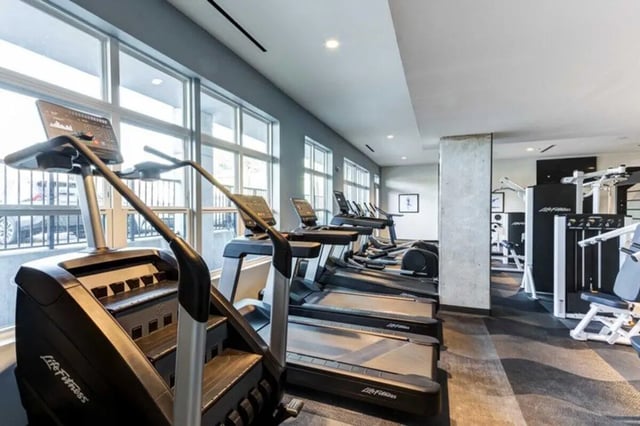 Treadmills stair climber weight machines gym area at The Helmsman in Savannah Student Accommodation