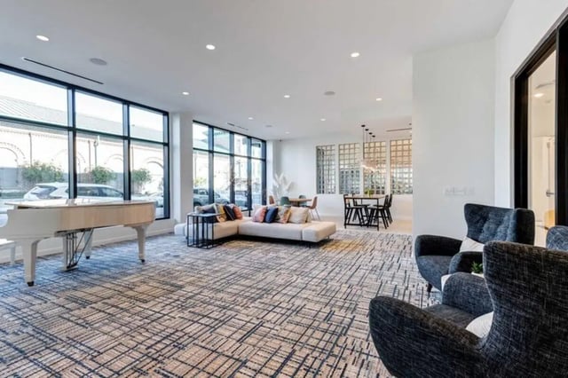 Piano sectional chairs dining tables living area at The Helmsman in Savannah Student Accommodation