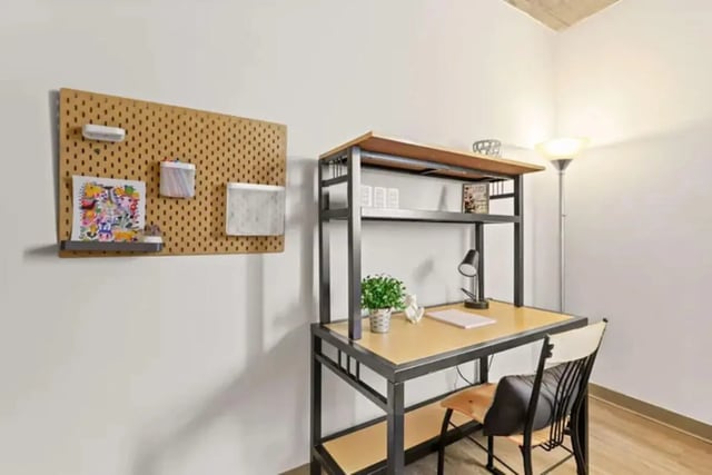 Desk with lamp pegboard and chair study area at Auraria Student Lofts in Denver Student Accommodation