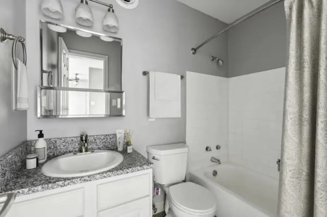 Sink toilet bath and shower curtain Bathroom at Chestnut Springs Apartments in Colorado Springs Student Accommodation