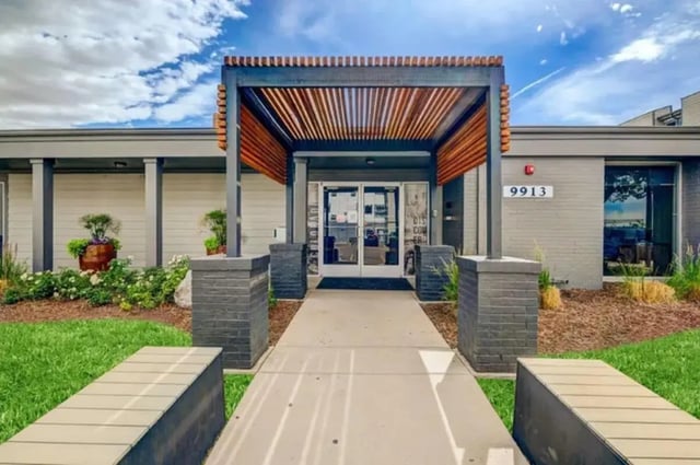 Entrance with pergola and benches exterior at Copper Chase Apartments in Colorado Springs Student Accommodation