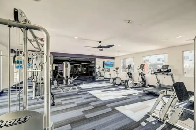 Gym equipment treadmills elliptical machines fitness gym at Flight at Lowry in Aurora Student Accommodation