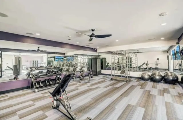 Dumbbells benches exercise balls gym equipment gym at Flight at Lowry in Aurora Student Accommodation