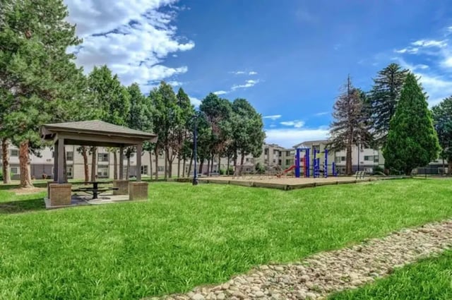 Picnic shelter and playground on grass exterior at Flight at Lowry in Aurora Student Accommodation
