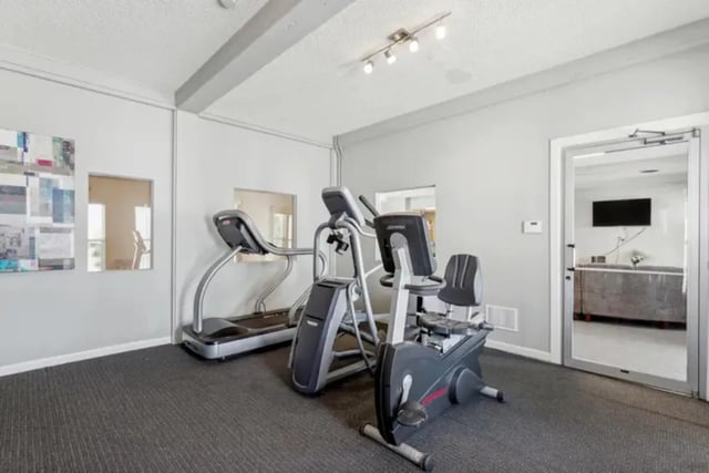 Treadmill elliptical and recumbent bike gym at Lincoln Springs Apartments in Colorado Springs Student Accommodation