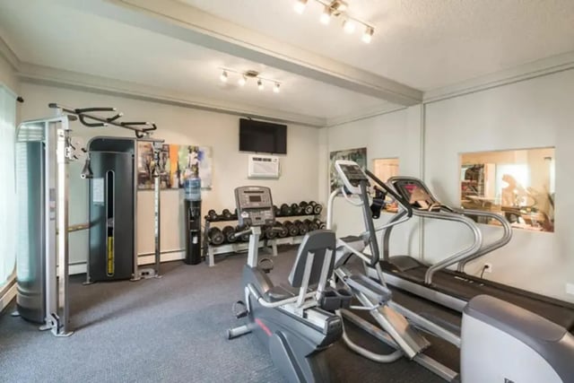 Weight machines treadmills and dumbbells gym area at Lincoln Springs Apartments in Colorado Springs Student Accommodation