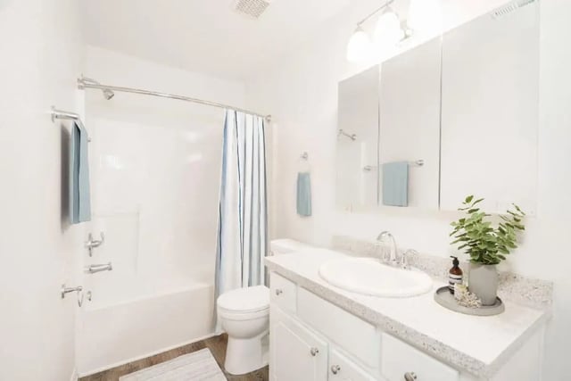 White bathroom with sink toilet bathtub shower curtain bathroom at Newport Square Apartments in Colorado Springs Student Accommodation