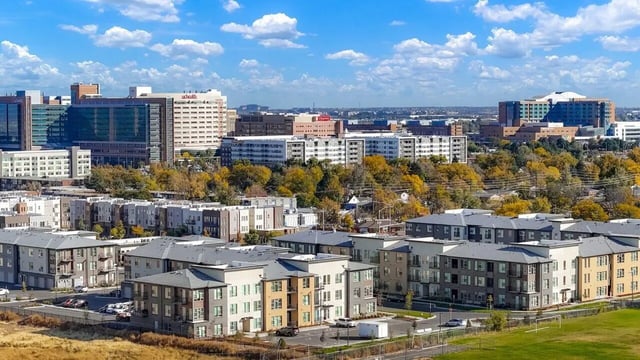 Apartment buildings and hospital exterior at Vida @ Fitzsimons in Aurora Student Accommodation
