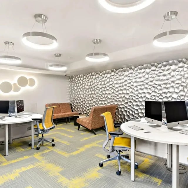 Modern computer desks sofas patterned wall study area at The Den in Columbia Student Accommodation