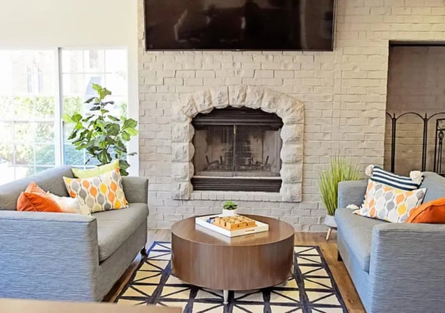 Fireplace two sofas coffee table living room at The Overlook at Nacogdoches in Nacogdoches Student Accommodation