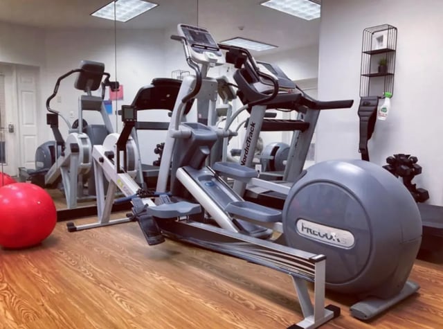 Rowing machine treadmill elliptical red ball gym at Auden Ithaca in Ithaca Student Accommodation