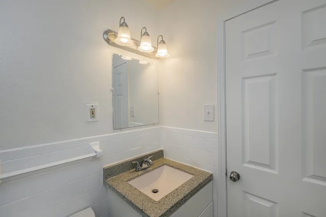 Sink mirror light fixture and door bathroom at Belmont Crossing in Smyrna Student Accommodation