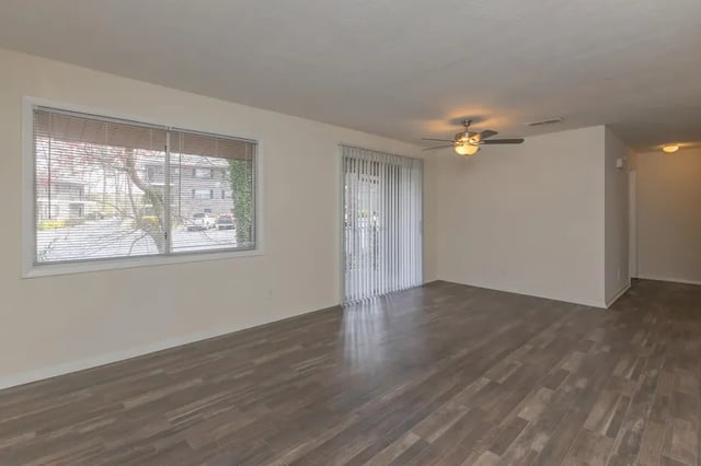 Large empty room with blinds and fan living room at Villas De Las Colinas 2 in Atlanta Student Accommodation