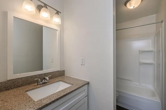 Sink mirror shower tub bathroom at Villas De Las Colinas 4 in Atlanta Student Accommodation
