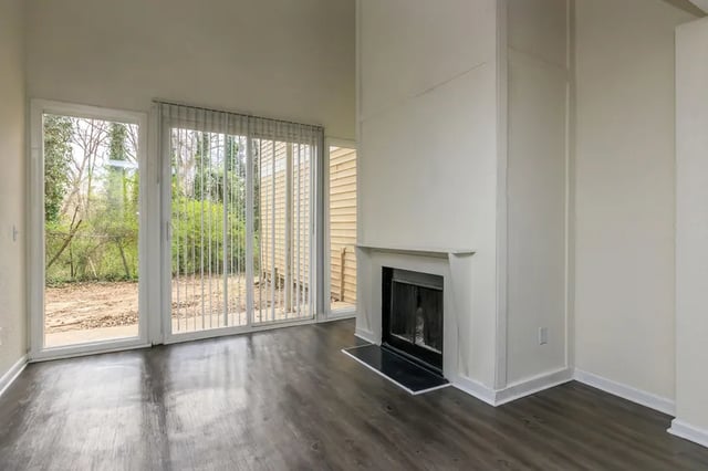 Fireplace and sliding glass doors living room at Villas De Las Colinas 4 in Atlanta Student Accommodation
