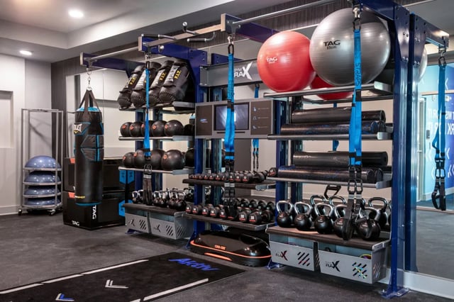 Gym equipment weights balls punching bag gymnasium at The Indy Apartments in Marietta Student Accommodation