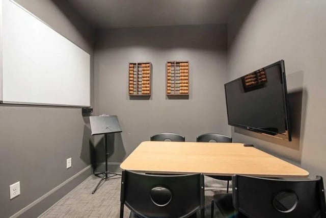 Whiteboard abacuses TV table chairs study area at University Edge-Cincinnati in Cincinnati Student Accommodation