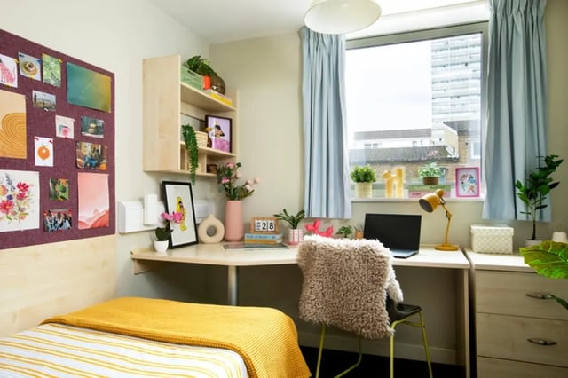 Bed desk chair and shelf bedroom at Quantum Court in London Student Accommodation