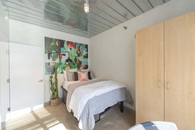 Bed art cactus and wardrobe bedroom at The Abigail in Columbus Student Accommodation
