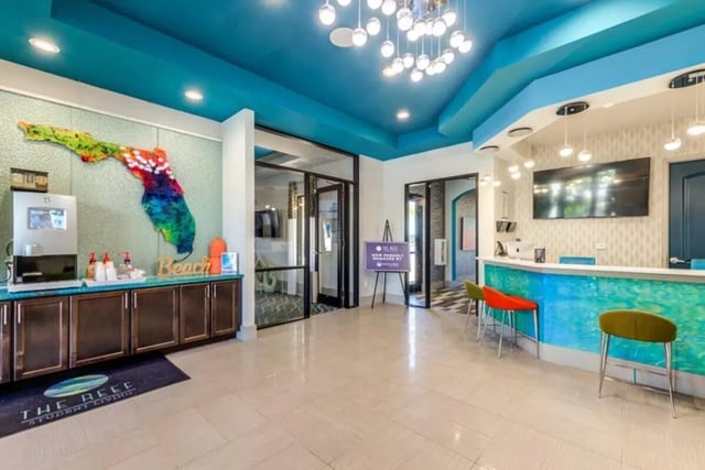 Florida map water dispenser reception desk lobby at The Reef in Fort Myers Student Accommodation