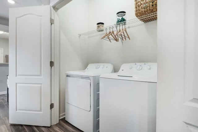 White washers on wood floor with open door laundry area at The Lodge on the Trail in West Lafayette Student Accommodation