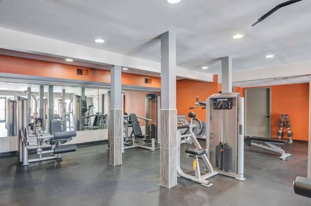 Weight machines and mirrors gym area at Terrace View in Blacksburg Student Accommodation