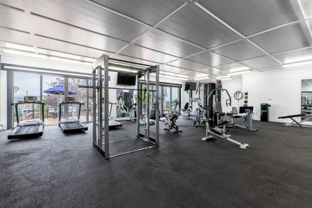 Treadmills and weight machines gym at The Village of Meadowview in Boone Student Accommodation