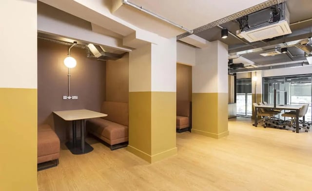 Booth seating tables and chairs study area at New Medlock House in Manchester Student Accommodation