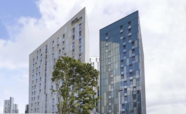 Modern student accommodation buildings with Unite Students branding exterior at Parkway Gate in Manchester Student Accommodation