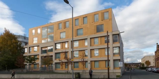 Modern building with many windows and balconies Exterior at One & Two Victoria Point in Manchester Student Accommodation