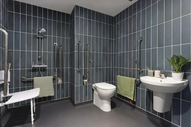 Accessible shower toilet sink and plant bathroom at Kincardine Court in Manchester Student Accommodation