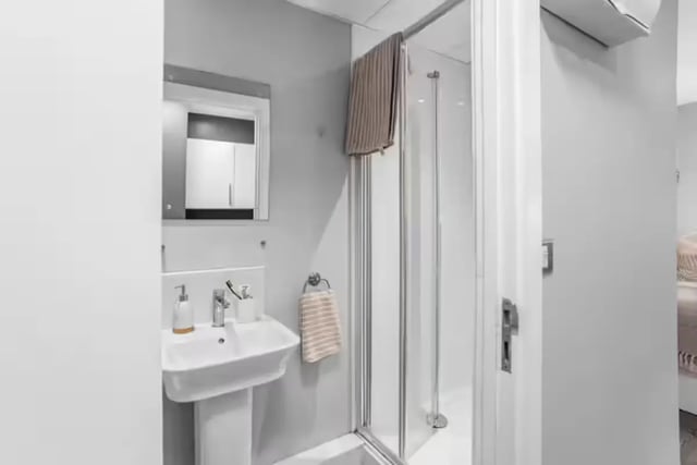 Sink shower mirror towel rack bathroom at Northgate House Apartments in Cardiff Student Accommodation