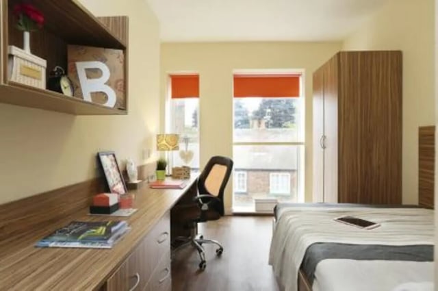 Desk chair wardrobe bed and shelf bedroom at Trinity Hall in Chester Student Accommodation